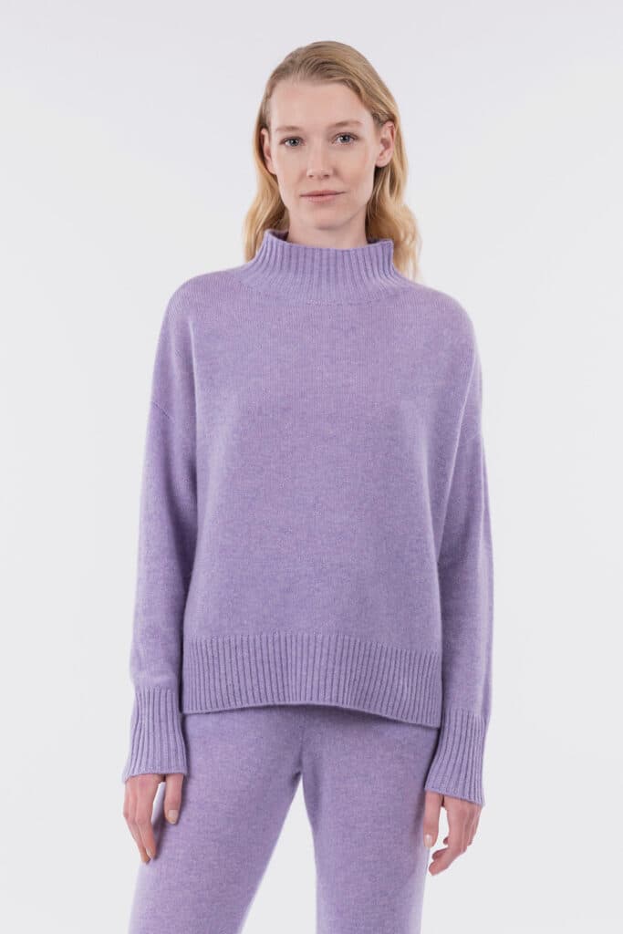 Asymmetric pullover with volcano neck